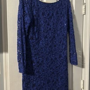 A blue cocktail sequin dress with a lining.